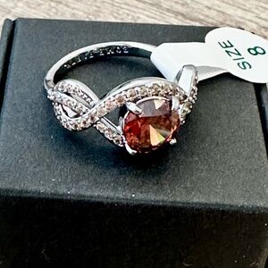Elegant Silver and Red Infinity Ring